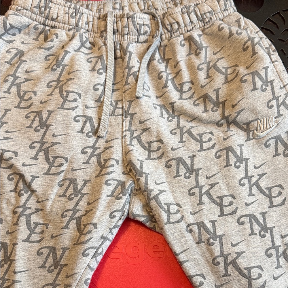 Nike Gray All-Over Logo Joggers